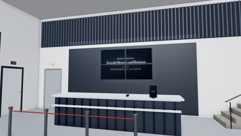Empfangsbereich eines Bürogebäudes mit Videowand und Wegeleitung