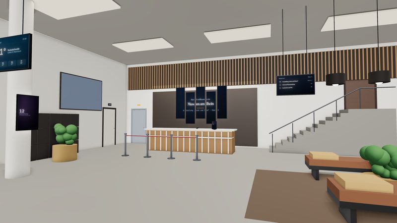Videowand mit Wegeleitung hinter dem Empfang eines Museumsfoyers