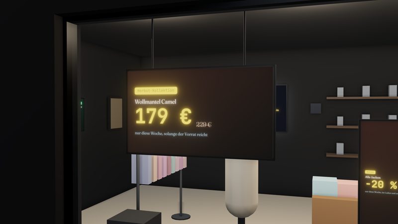Detailansicht eines Fenster-Displays in einer Boutique bei Nacht