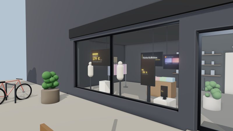 Modernes Schaufenster bei Tag mit abgehängtem Display und Stele